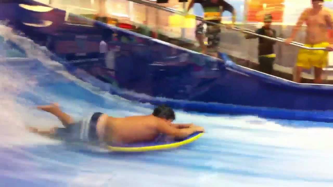 Kid on flowrider and his pants come off!
