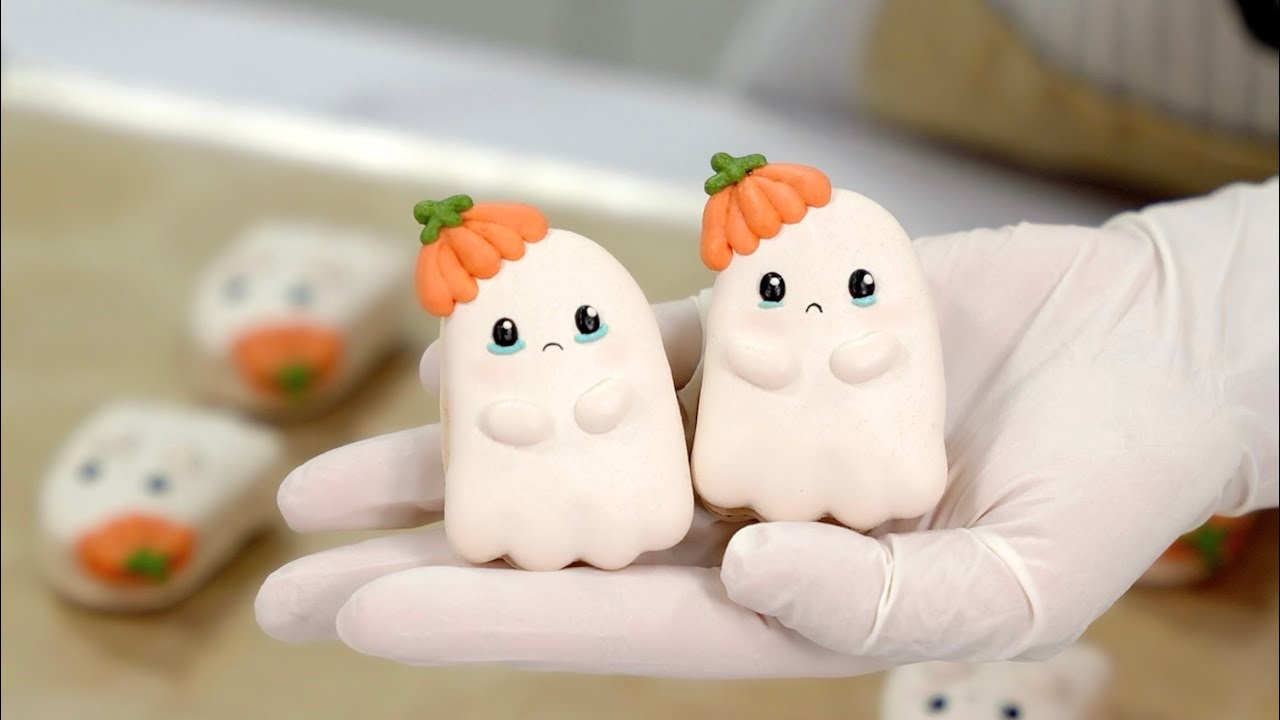 Halloween Ghost Macarons with a Pumpkin Hat