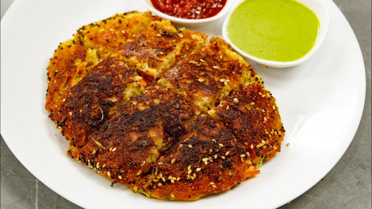 Instant Handvo Recipe - Crunchy Tasty Rice Dal Savory Cake - CookingShooking