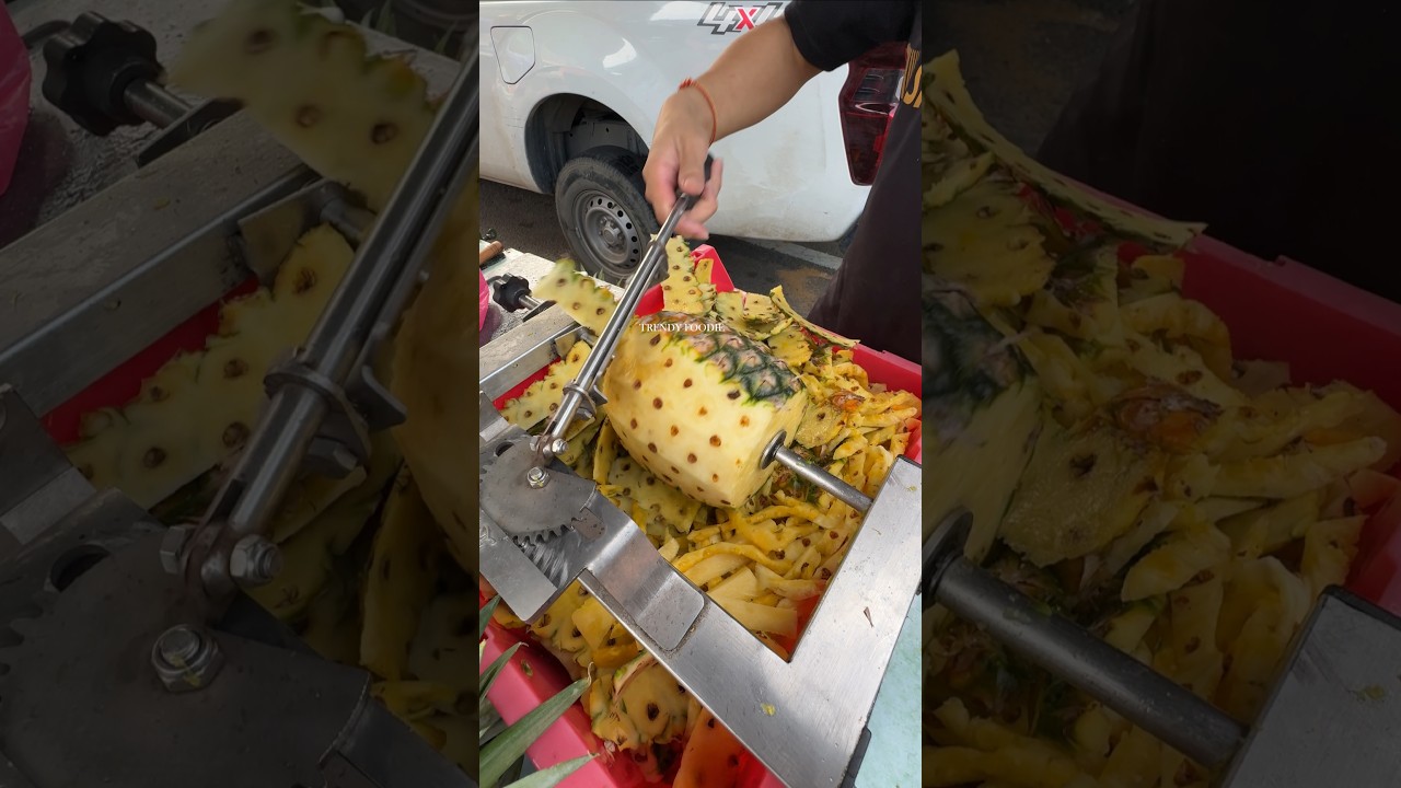 The world's most amazing pineapple cutting machine!!!