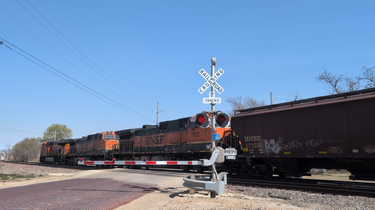 BNSF 8265 leads a loaded grain train in Hutch with 2 H1s!!!!