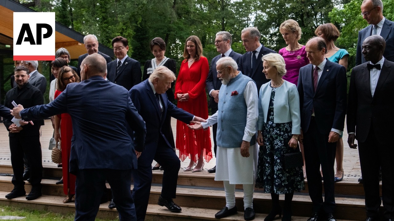 Modi helps Trump up a step as G7 leaders pose for photo at summit
