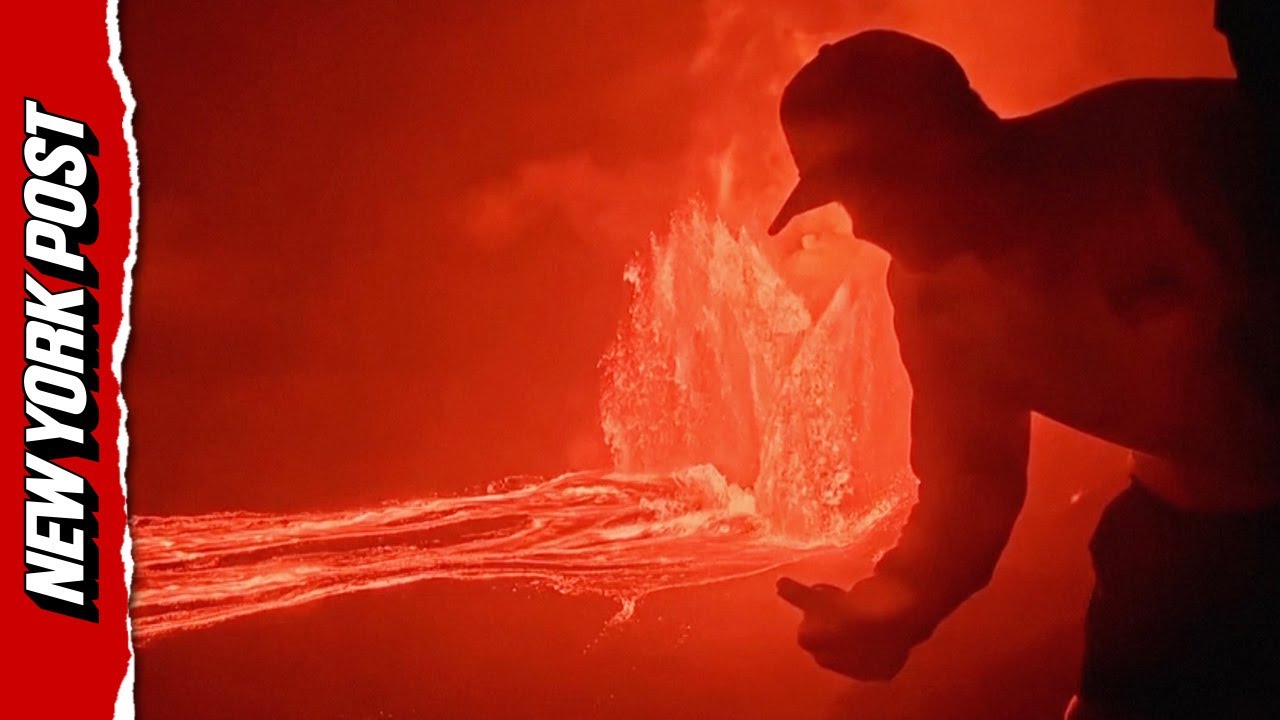 Insane Moment Two People Walk Dangerously Close to Hawaii's Kilauea Volcano as It's Erupting