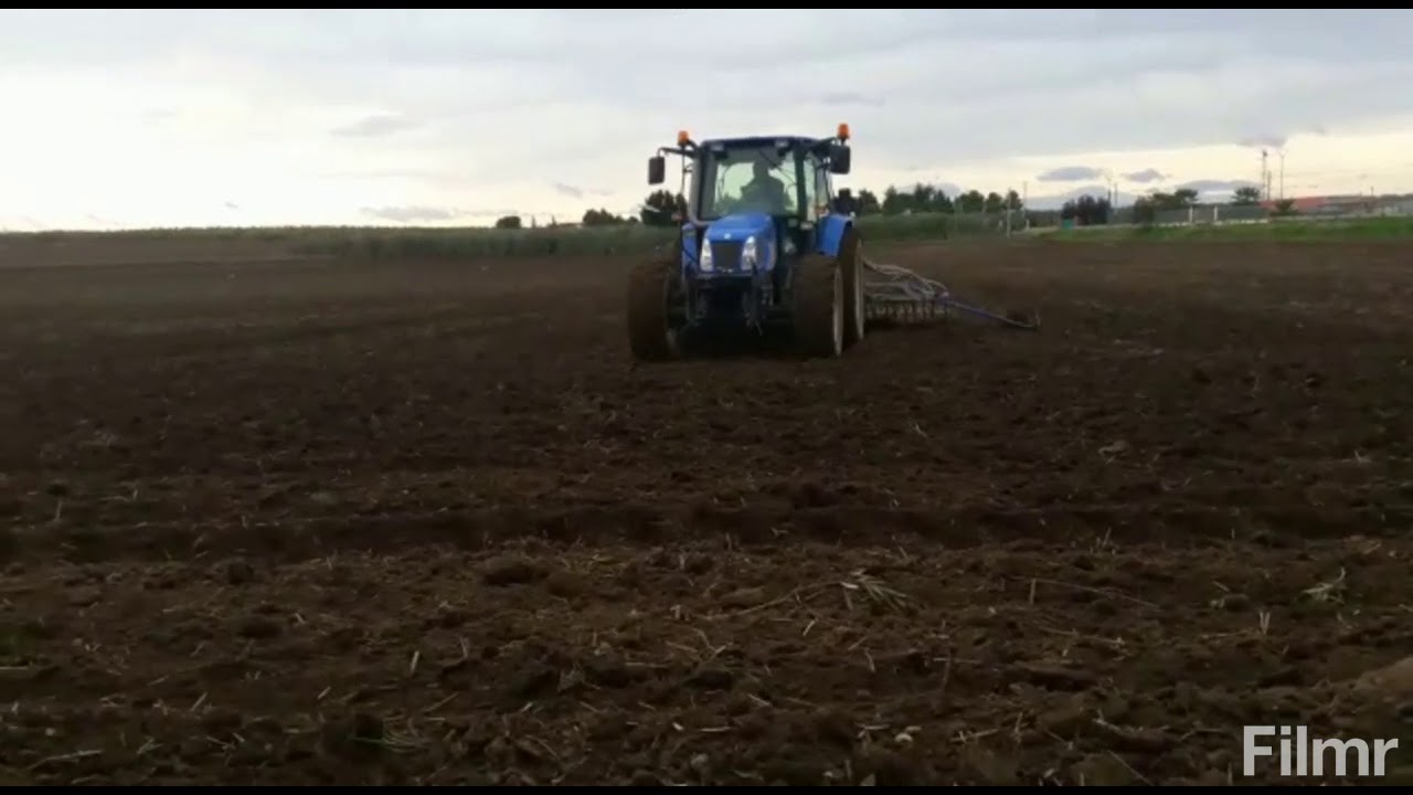 New holland tl100a con seminatrice vertulli