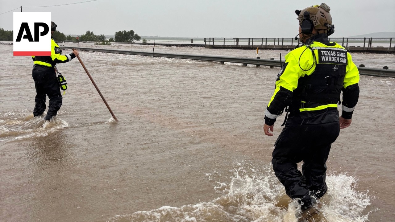 Flooded Leona River cuts the town in two in Uvalde, Texas