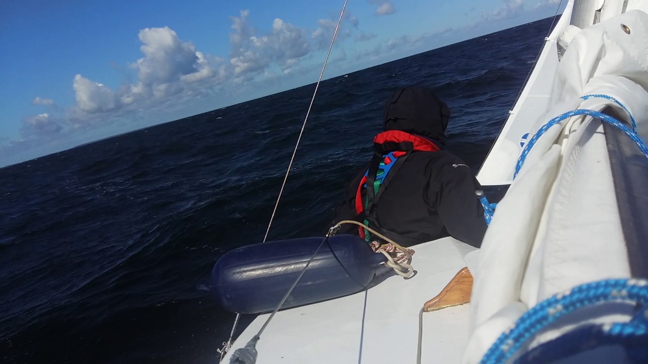 "Kvark" motorsailing in 2 m waves
