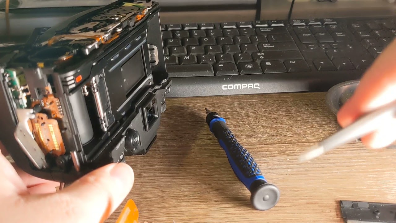 Minolta Maxxum 7 / Dynax 7 / A7 Film Door Replacement Repair.