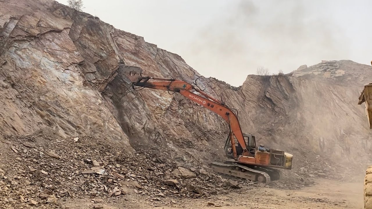 Amazing excavator performance | Breaking huge rocks with powerful machinery 💯
