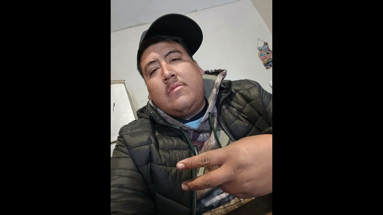 Julio Escobar (la papá)