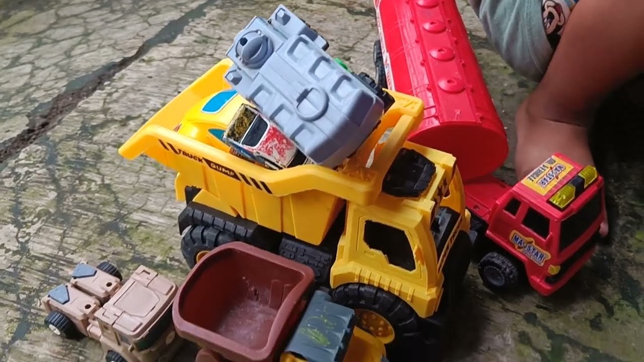 MEMUAT MBIL KE TRUK DUMP