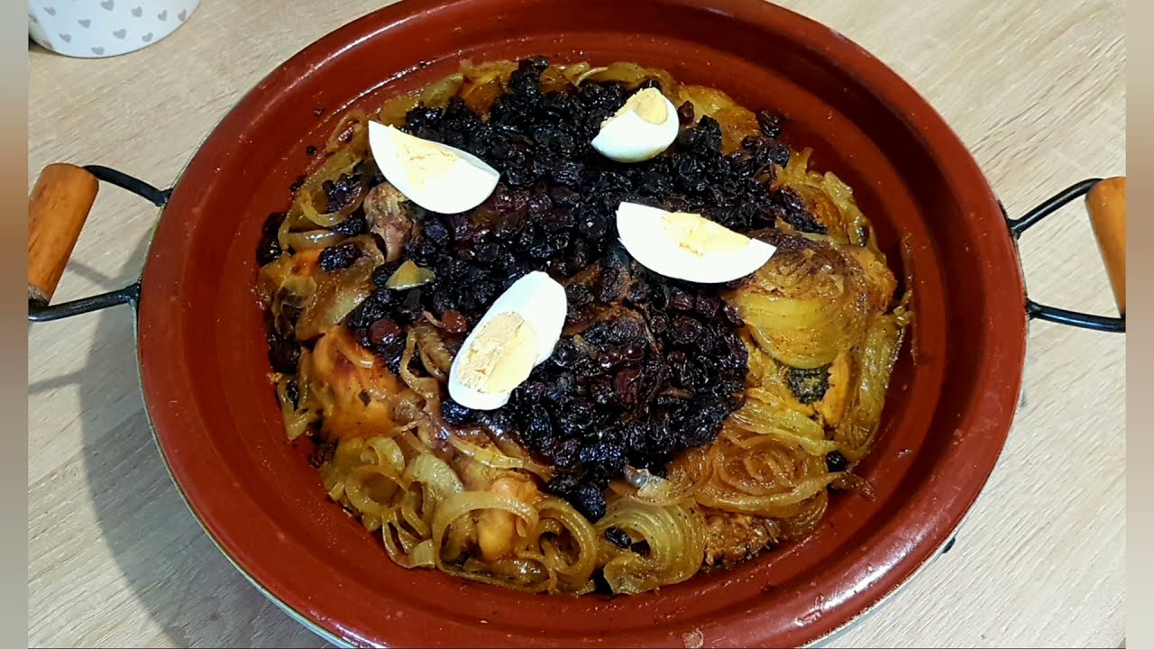 tajin de pollo con cebolla y uvas pasas  طاجين مغربي باالدجاج  والعنب المجفف