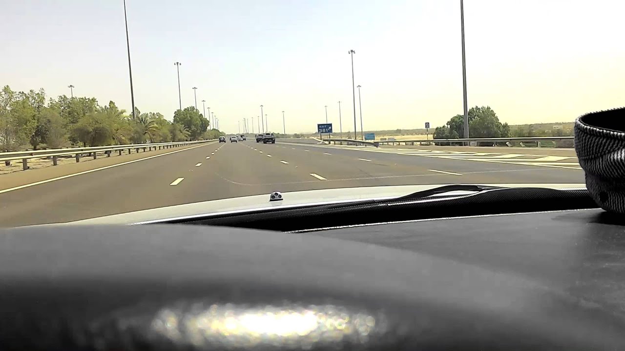 Dubai visit summer 2015 driving and listening to music/KIA Opirus