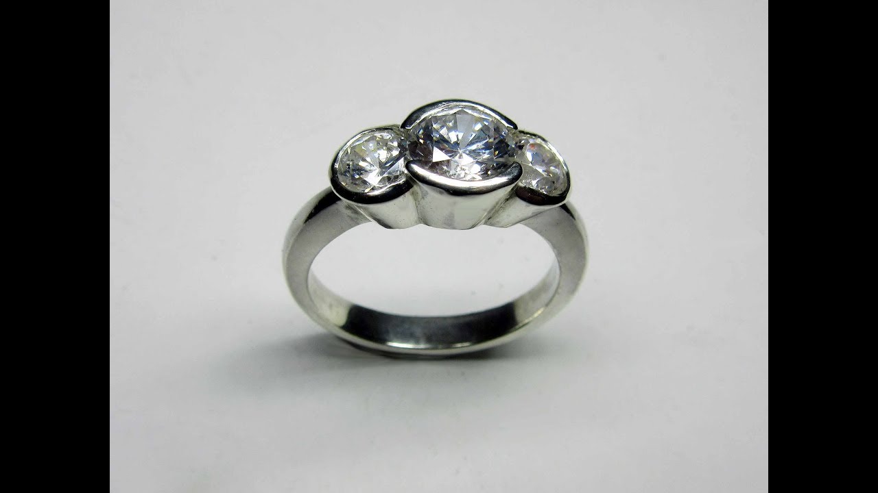 Bezel set three stone ring preview
