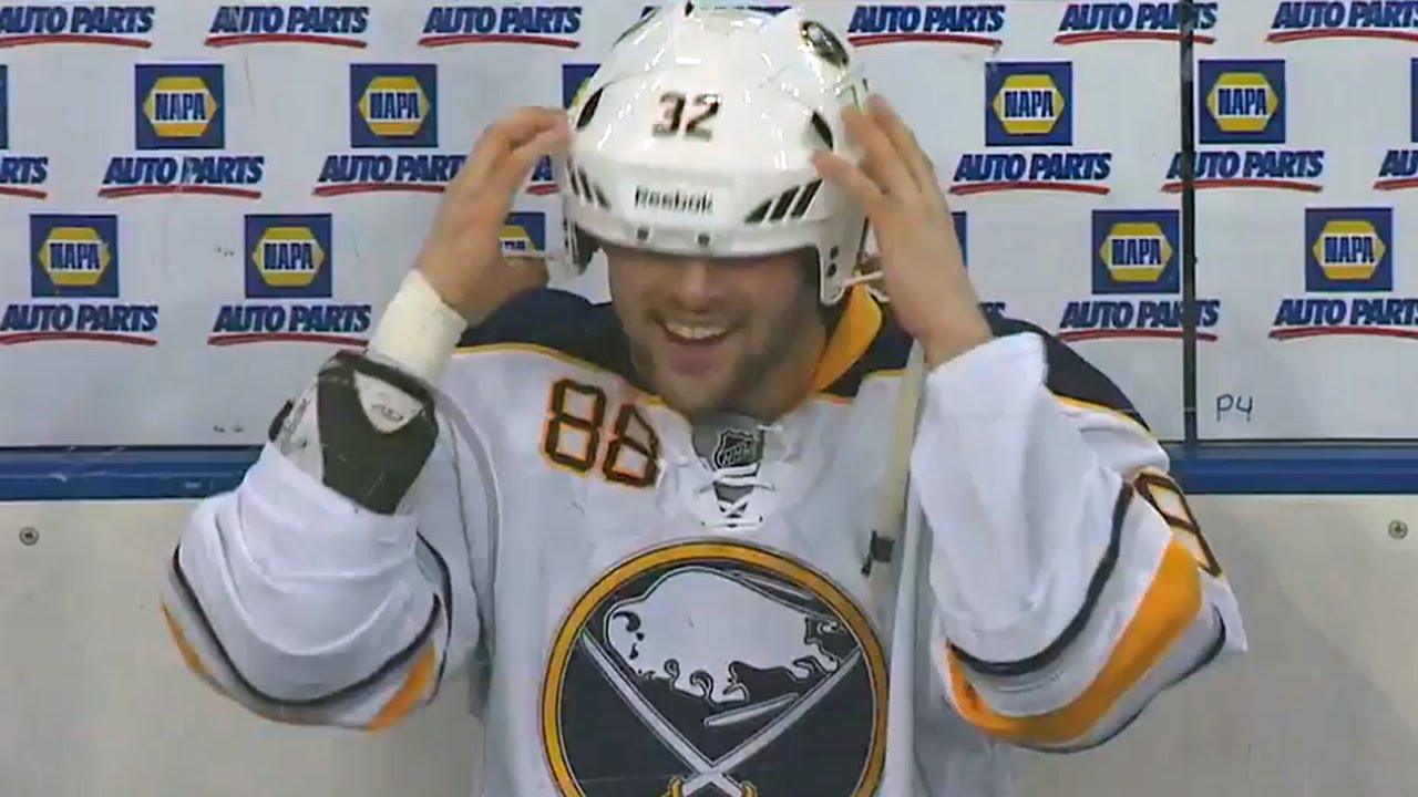 Cory Conacher wears a giant helmet