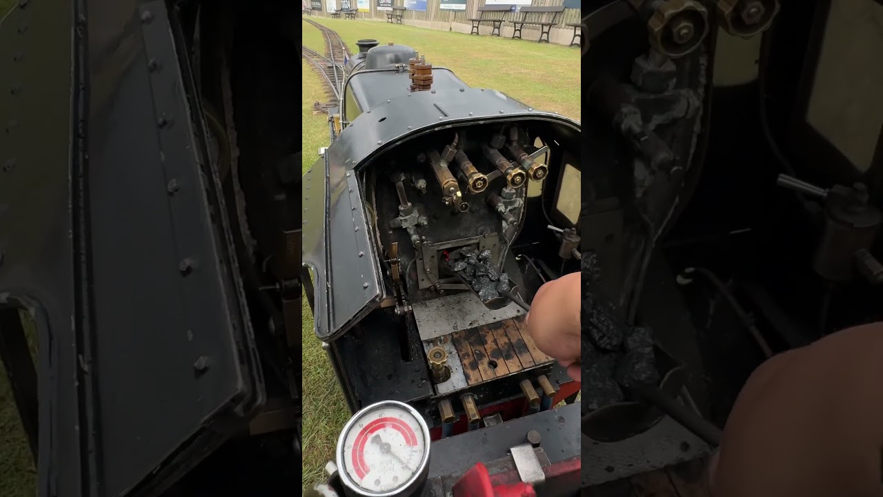 Putting coal in a steam loco #train #steamengine