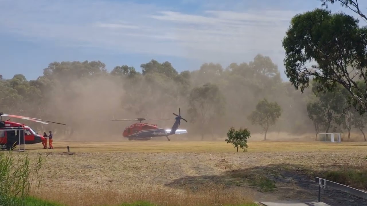 Black Hawk water bomber landing