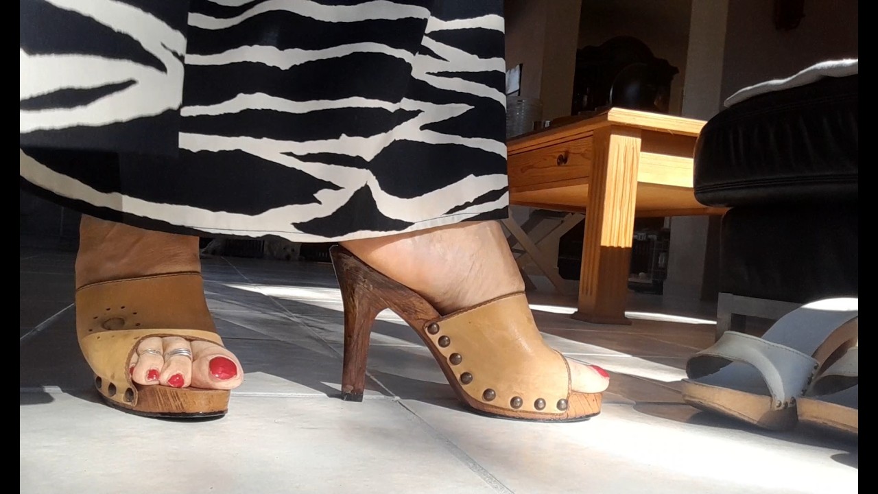 Lady Pia shows her wooden CANDIES mules of 1974, 1997 and Dr. Scholl