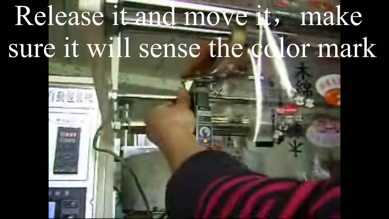 Vertical Packaging Machine(Film installing and photoelectric eye using ）