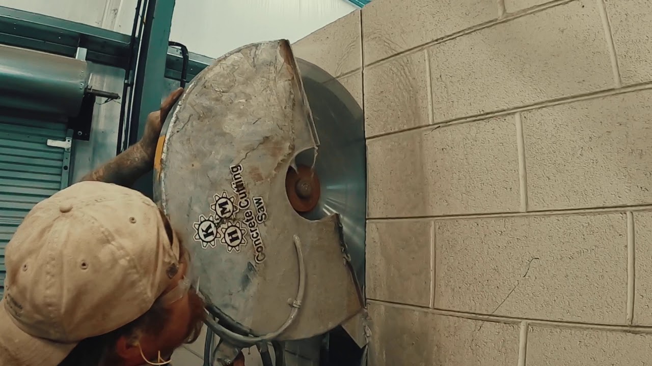 Concrete handsaw up a wall