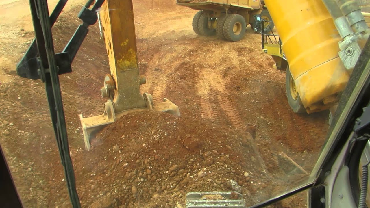 Liebherr R974C loading Caterpillar 773F from cab - Part 1