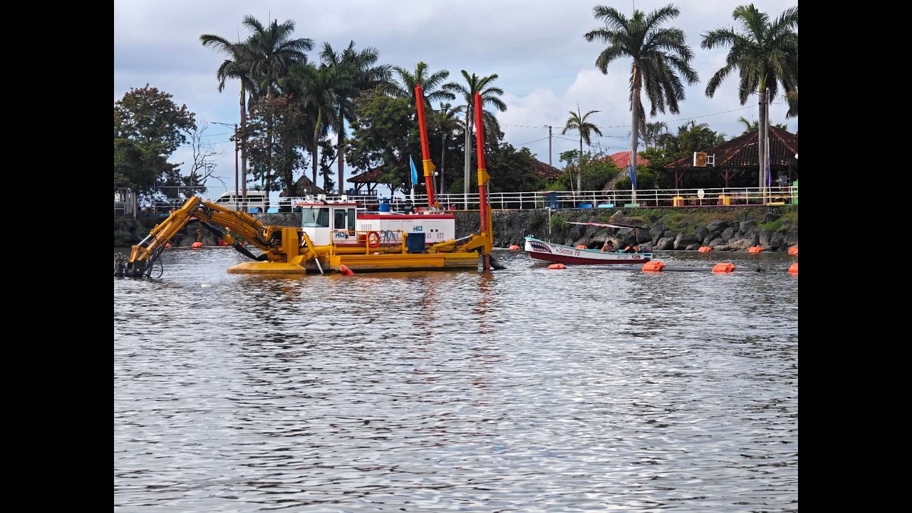 Amphibious Multipurpose Dredge Machine Operating in River Ports