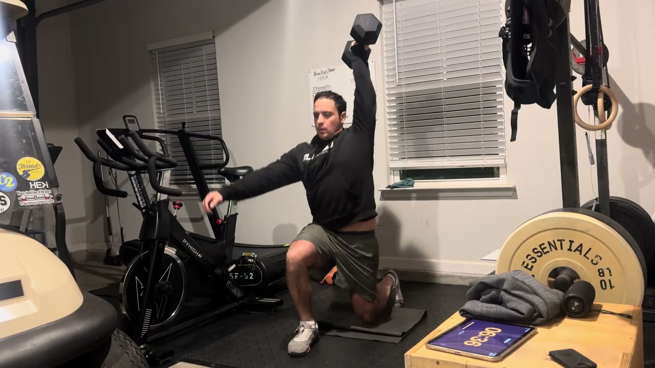 AMRAP10 12 Cal Bike, 8 Single Arm Dumbbell Overhead Lunge 50lbs