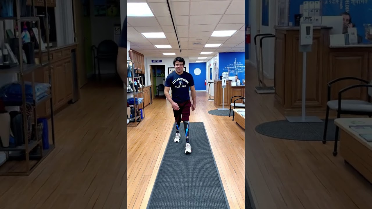 Bilateral Below-Knee Amputee Walking with Prosthetic Legs
