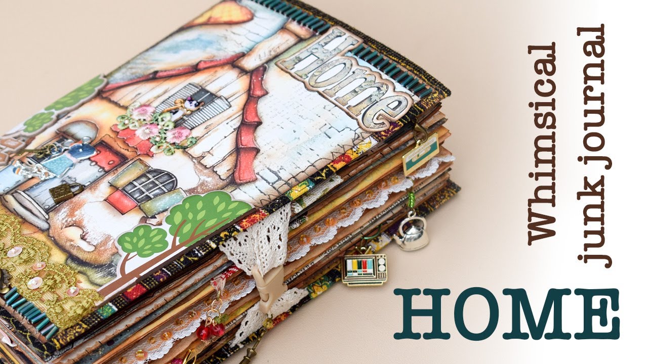 WHIMSICAL HOME Handmade junk journal with interactive elements.