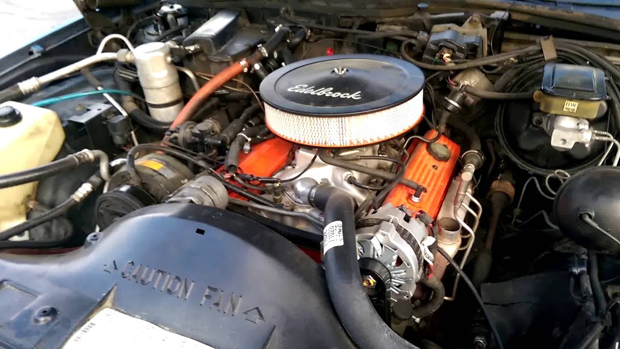 Chevy 305 with a little cam New Holley tbi intake