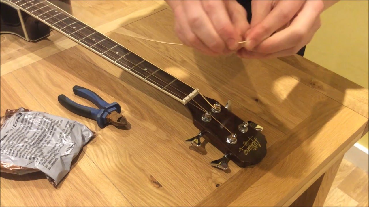 How To Restring (Change Strings On) an Acoustic Bass Guitar