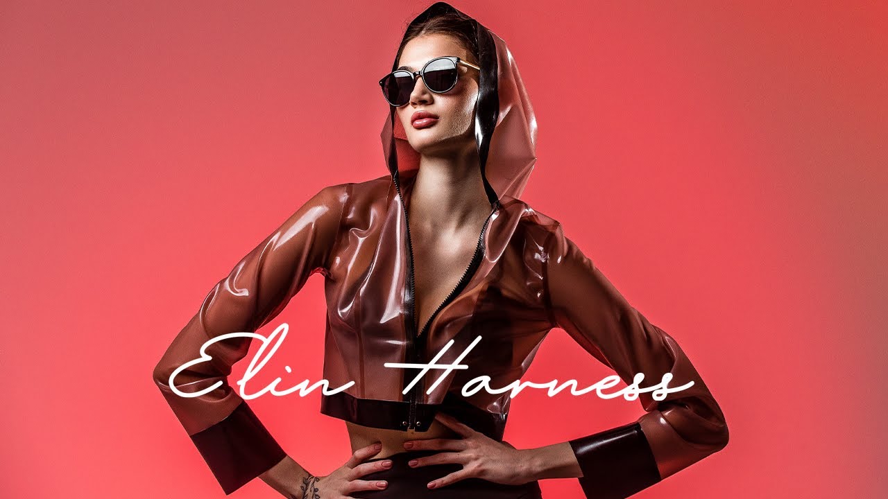 Latex shortcut jacket with a hood: Runway on the Track. Elin Harness
