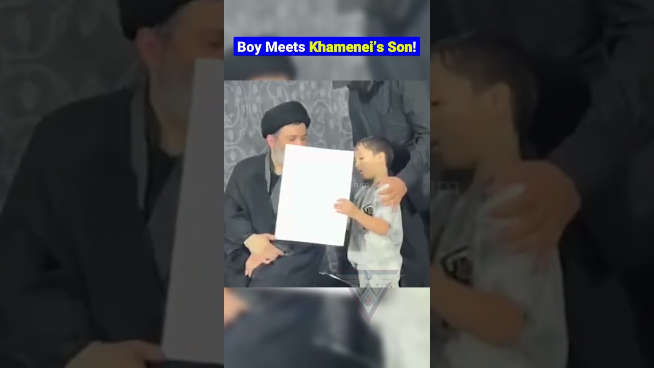Child Holds Khamenei Photograph