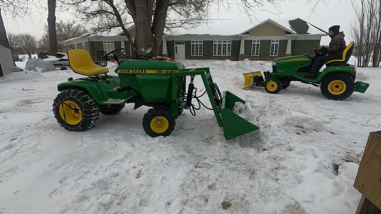 Trying out my homemade Buford loader for the 317 John Deere garden tractor