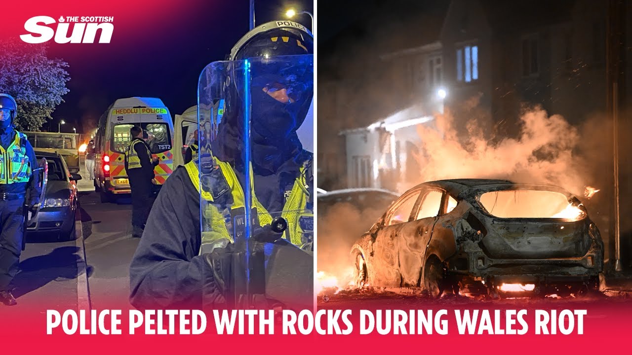 Huge riot in Wales sparked by two boys killed in crash see cars torched and police pelted with rocks