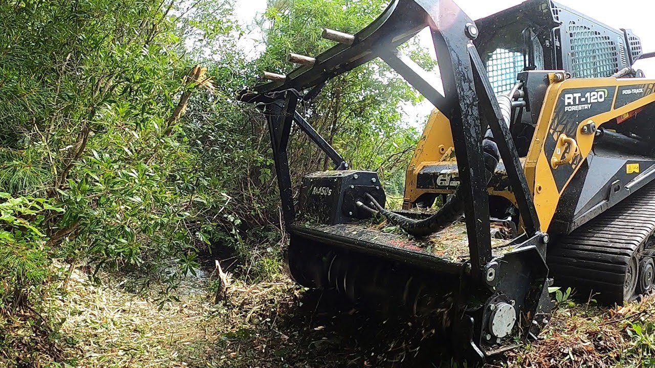 LIVING ON THE EDGE! OVERGROWN DITCHES NEED MAJOR MULCHING!