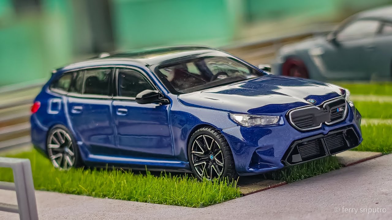 1/64 Scale BMW M5 Touring Marina Bay Blue Metallic by Mini GT (MGT01080)