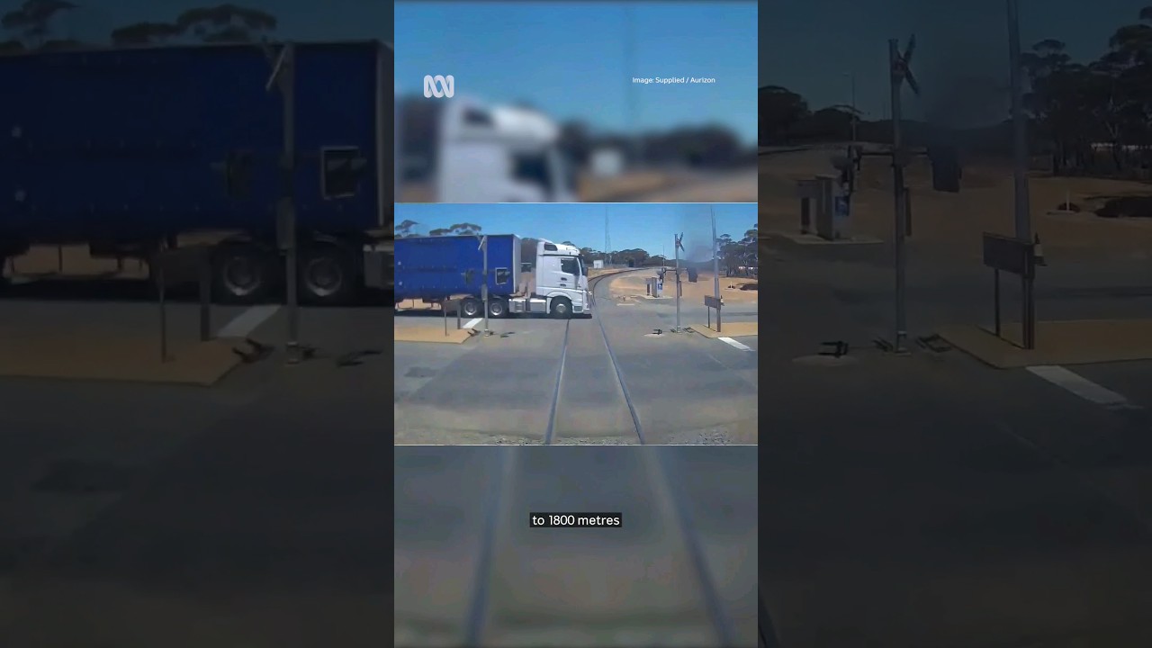 Freight train and truck seconds from disastrous collision
