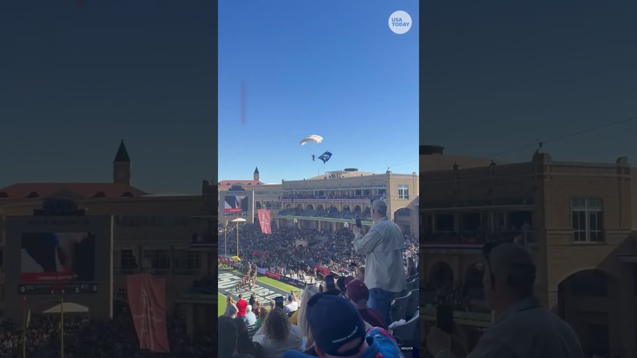 Parachutist gets tangled and takes a tumble at the Armed Forces Bowl