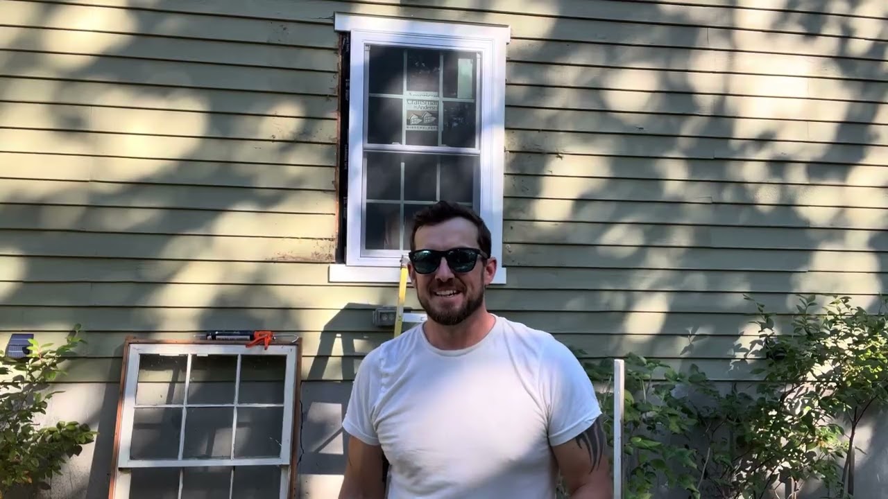 Installing a new construction window in an old construction opening.
