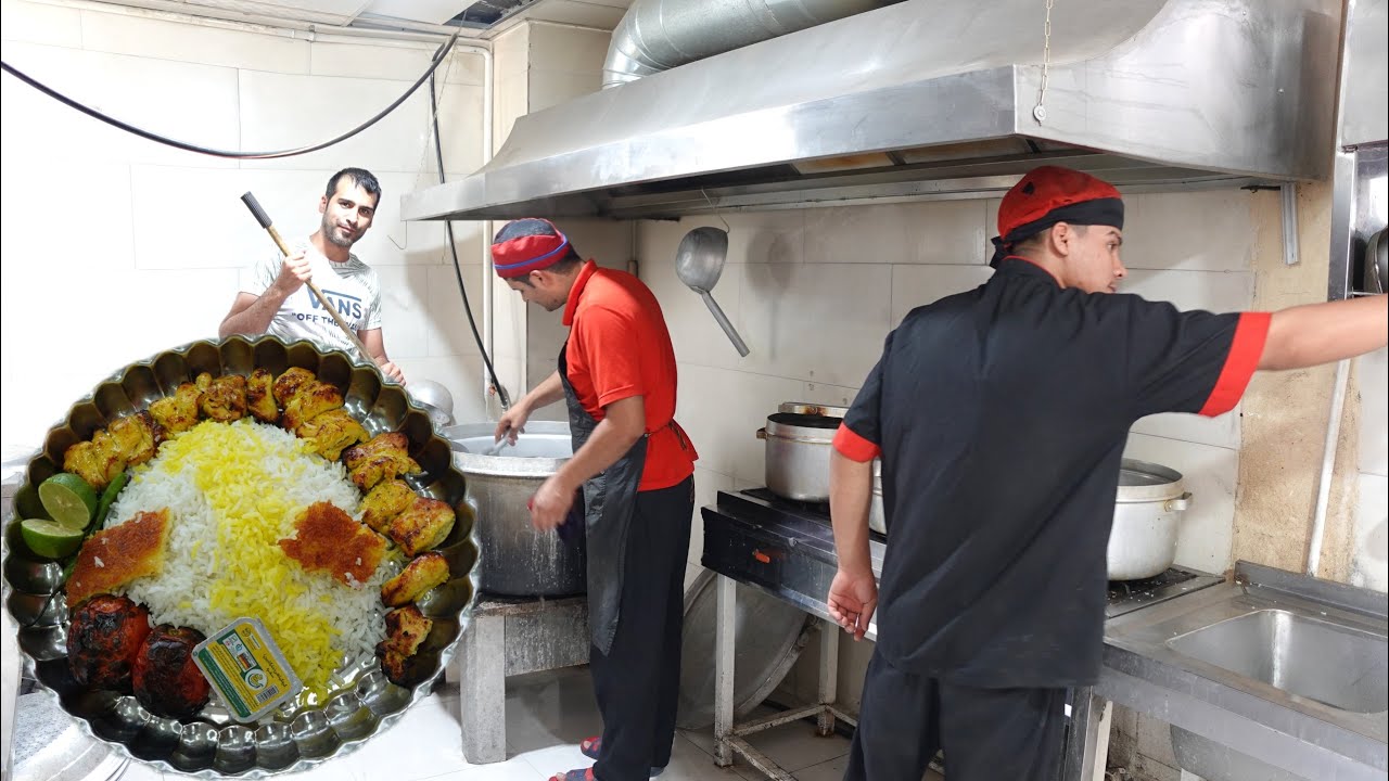 The most popular Iranian food \ Joojeh  kebab restaurant with saffron Tahchin