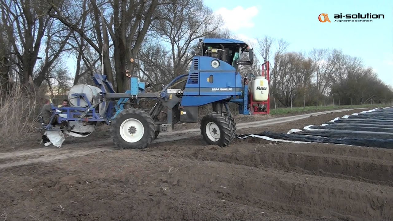 NewHolland Braud SB 64 laying b/w asparagus foil