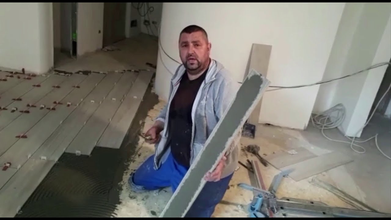 Posa pavimento effetto legno con cuni
