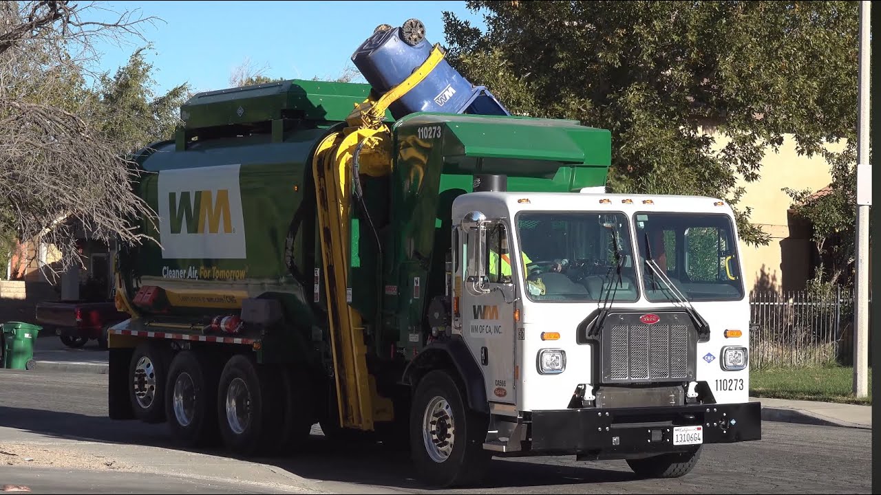One of Palmdales Brand New Peterbilt 520 Amrep Garbage Trucks 
