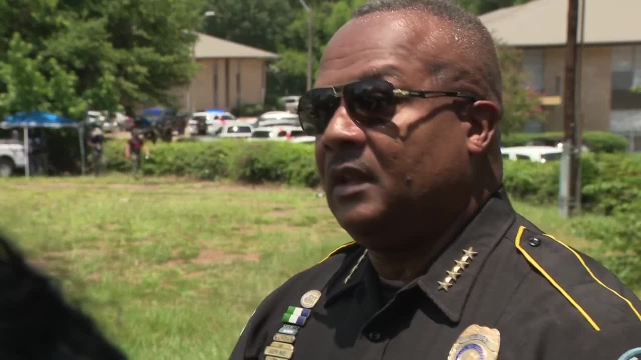 Woman killed, suspect surrenders after standoff