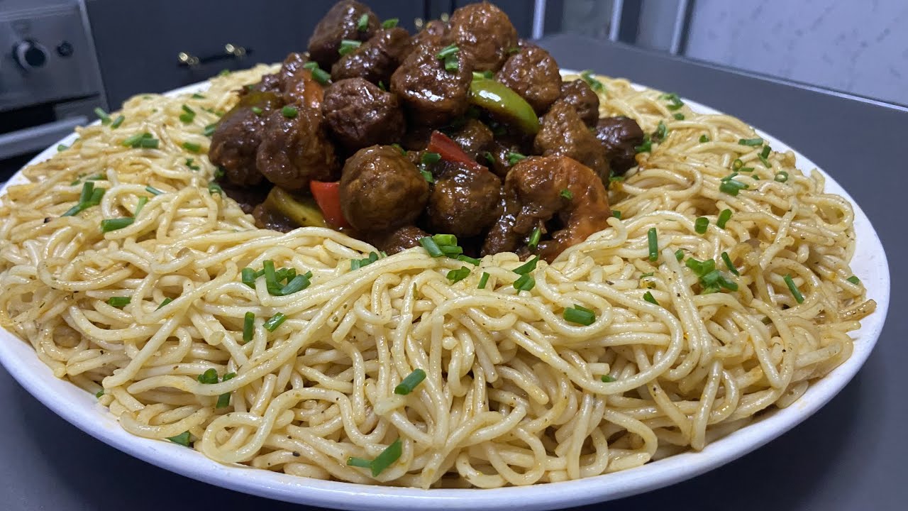 Boulette de poisson sauce tomate avec spaghettis ndiarna toogue