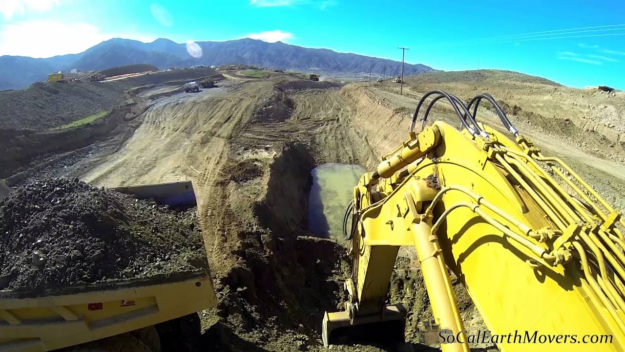 Digging a 25' deep trench... Using a CAT 5130B Excavator