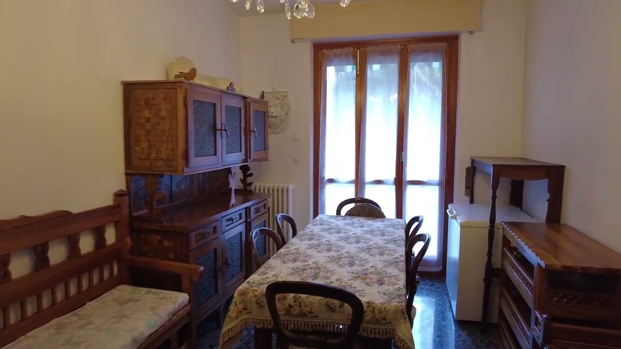 AMPIO APPARTAMENTO CON GRANDE GIARDINO E POSTO AUTO PRIVATO