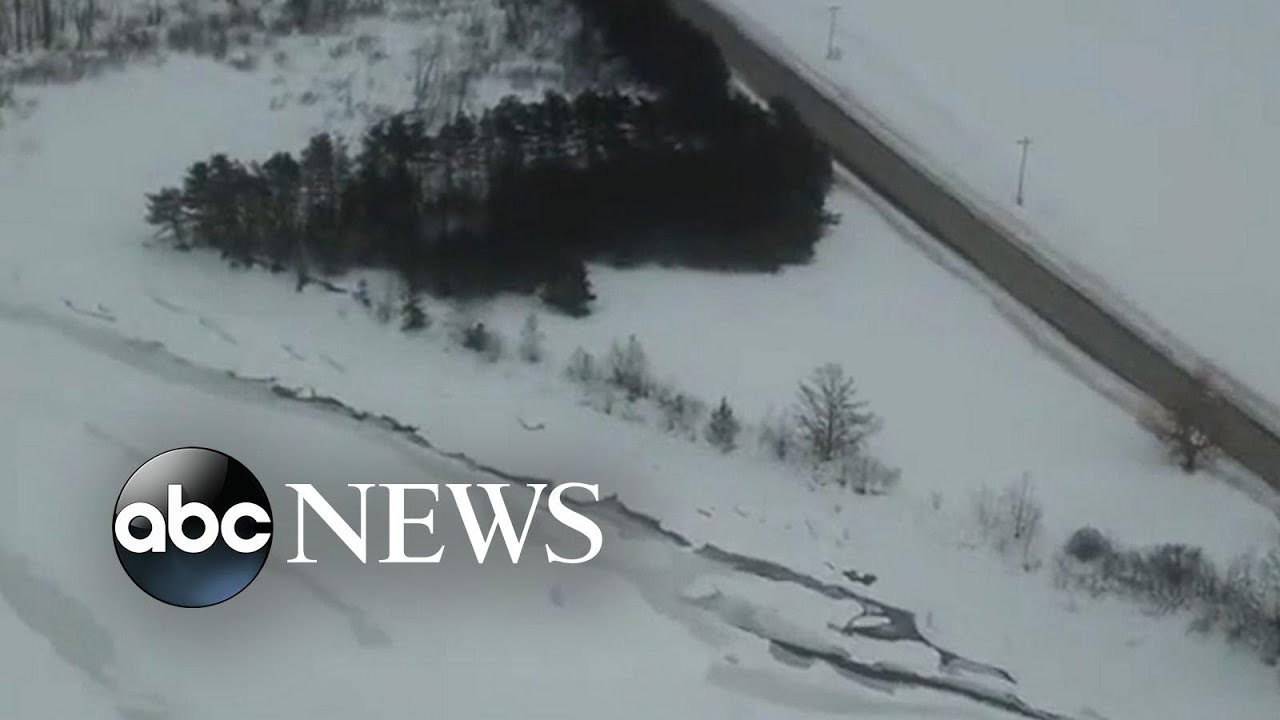 Snow covers Aroostock River in Maine