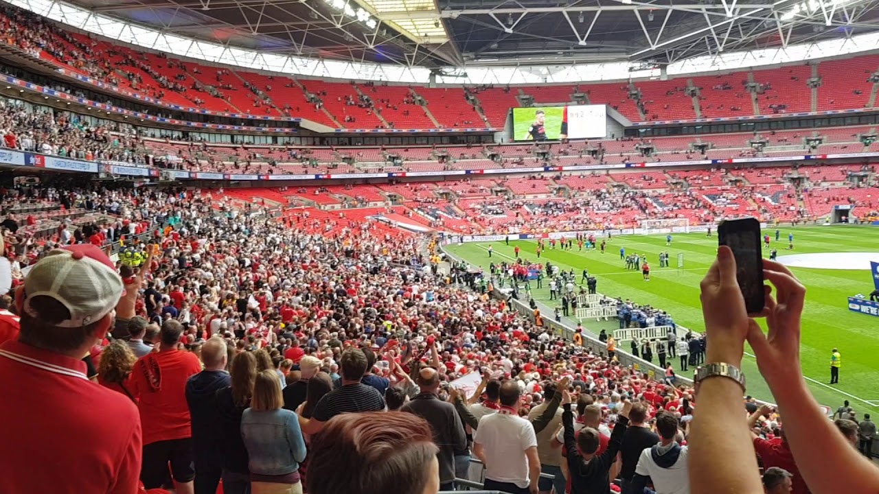 CHARLTON  ATHLETIC FANS SING THE RED RED ROBIN COMES BOB BOB  BOBBING ALONG AT WEMBLEY