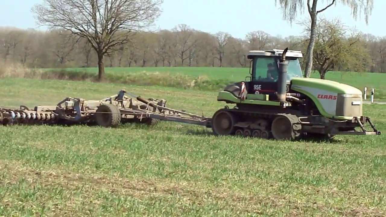 Claas 95E mit 10m Kurzscheibenegge